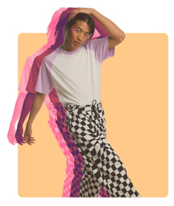 Happy marketing man with checkered pants and colorful background